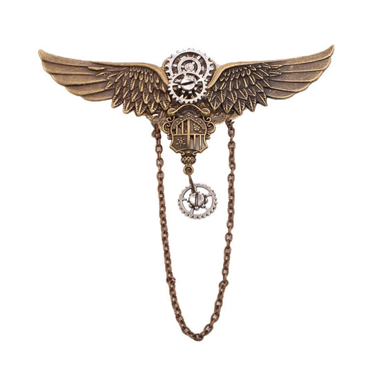 Bronze brooch with wings and chain on a white background